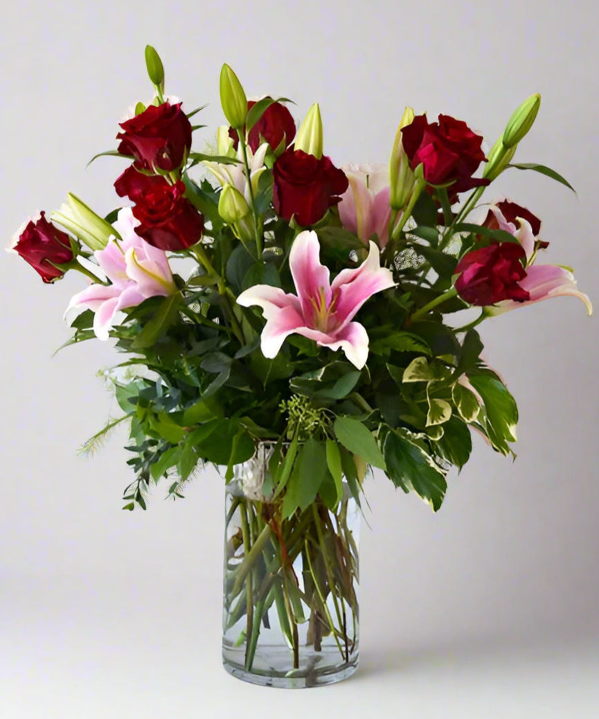 Elegant Valentine’s Day Vase Arrangement – 12 Red Roses & Lilies in a Tall Clear Glass Vase