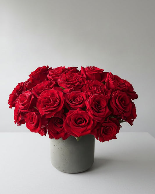 Bouquet of luxury red roses in a gray vase perfect for Valentine'sDay
