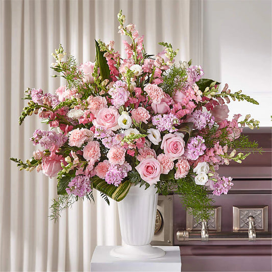 Blush Sympathy Pedestal Arrangement – Elegant Funeral & Memorial Flowers

Honor a loved one with our Blush Sympathy Pedestal Arrangement, a beautifully designed floral tribute for funeral and memorial services. This large sympathy arrangement is presented in a classic pedestal vase, creating a graceful and uplifting display.

Features:
Blush-toned blooms symbolizing love, remembrance, and peace
Premium flowers including pink roses, stock, carnations, snapdragons, and lisianthus